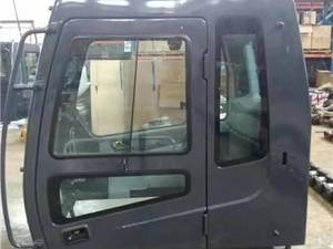  آریا یدک تهران | شیشه کابین بیل مکانیکی و قطعات داخل کابین 