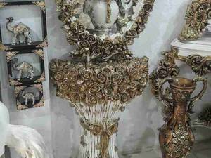 تندیس دختر کوزه به دست