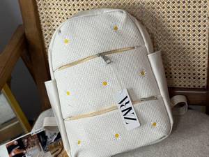 خرید کیف کنفی طرح بابونه‌دار در رشت