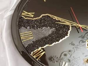 ساعت رزینی مشکی طلایی در تبریز