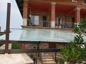 طراحی و اجرای سایبان شیشه‌ای در لنگرود